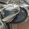 Knotted striped black napkin